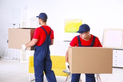Team member preparing van cargo with safety focus
