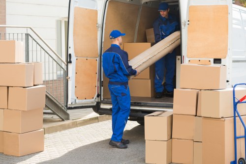 Man and van moving furniture in a Barnsbury residential street