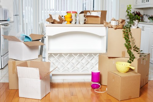 Local moving team handling furniture near Barnsbury properties