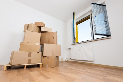 Packed boxes and furniture ready for removal in Barnsbury