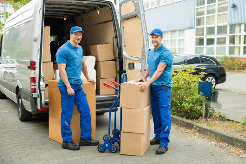 Moving crew loading business equipment for relocation